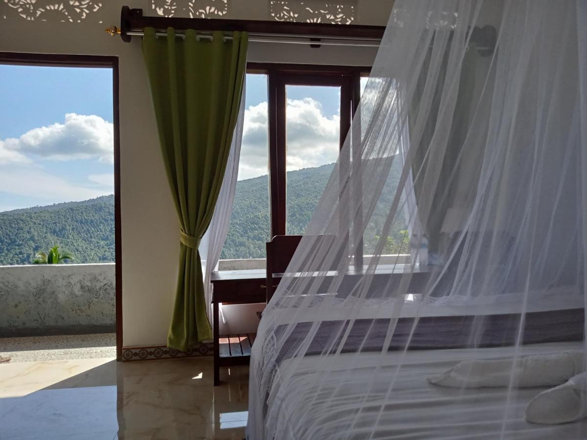 Aris Homestay And Warung Made มุนดุก ภายนอก รูปภาพ