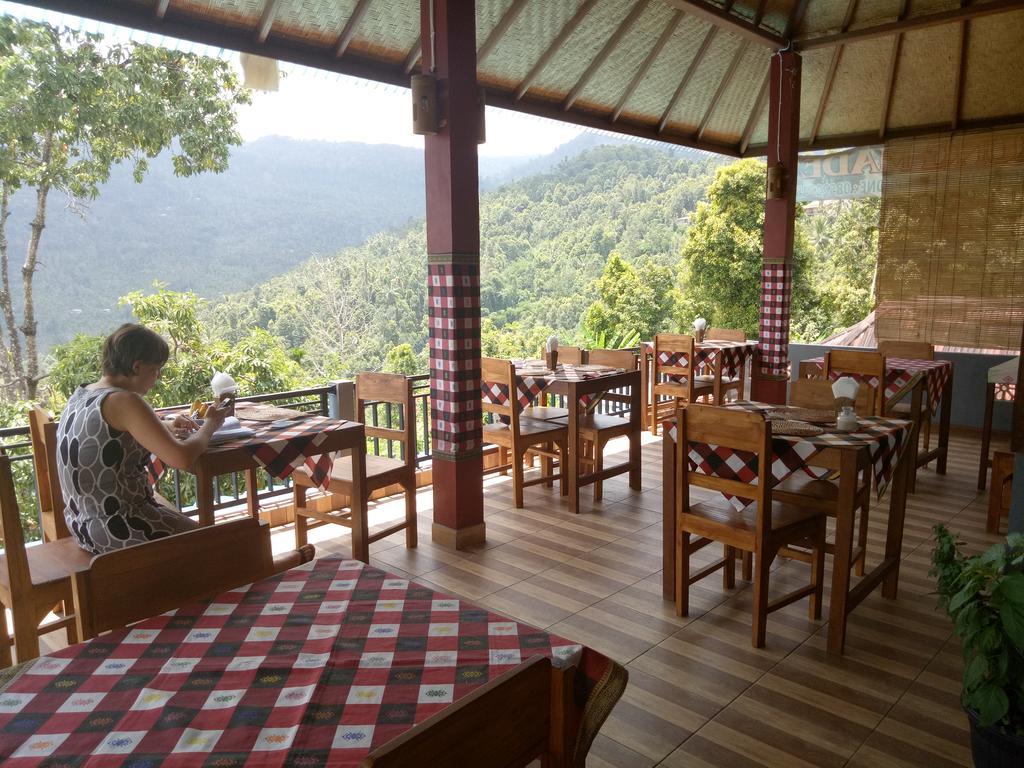 Aris Homestay And Warung Made มุนดุก ภายนอก รูปภาพ