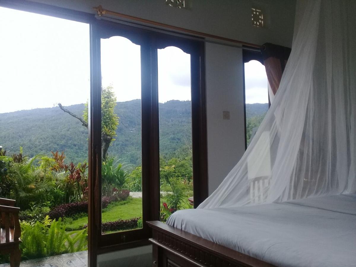 Aris Homestay And Warung Made มุนดุก ภายนอก รูปภาพ