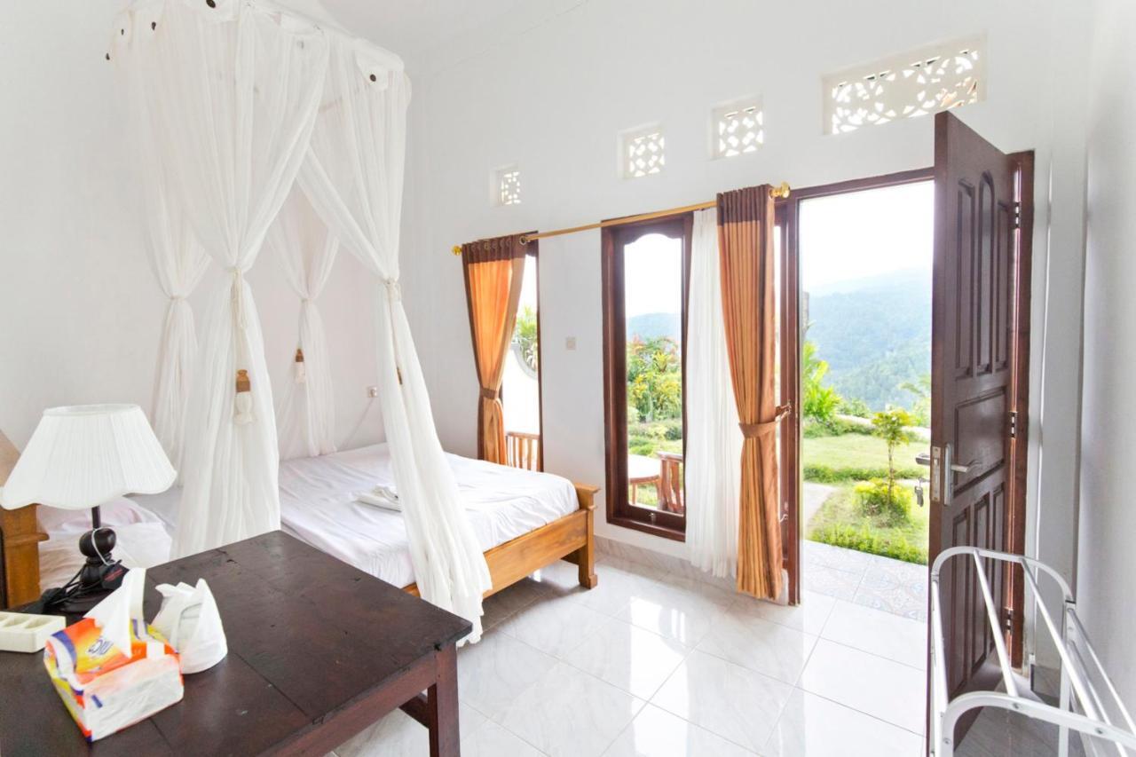 Aris Homestay And Warung Made มุนดุก ภายนอก รูปภาพ